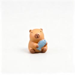 Cartoon Capybara Holding Fish Car Dashboard Figurine